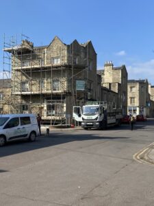 The cricketers and open doors - the cricketers with scaffolding on it