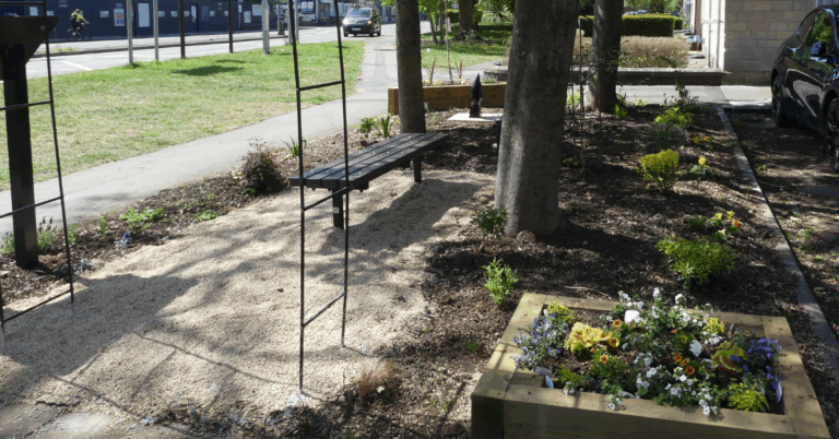 Picture of the completed community bench and garden area